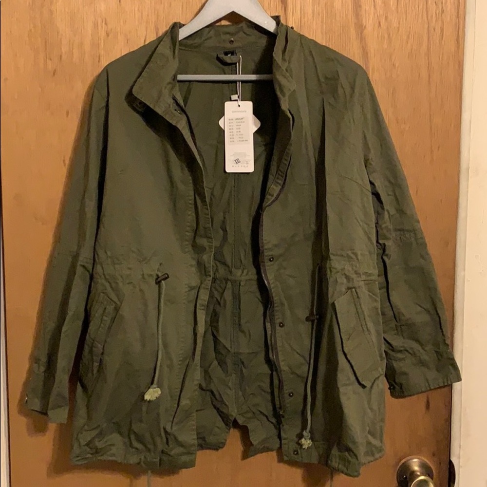 Green jacket with detachable hood.